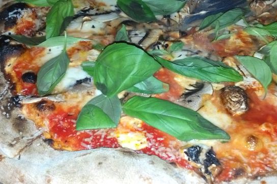 Last night's pizza party, with mushrooms, garlic and extremely fresh basil.